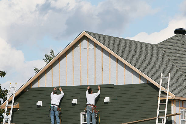 Professional Siding Repair technician working in Delta, OH